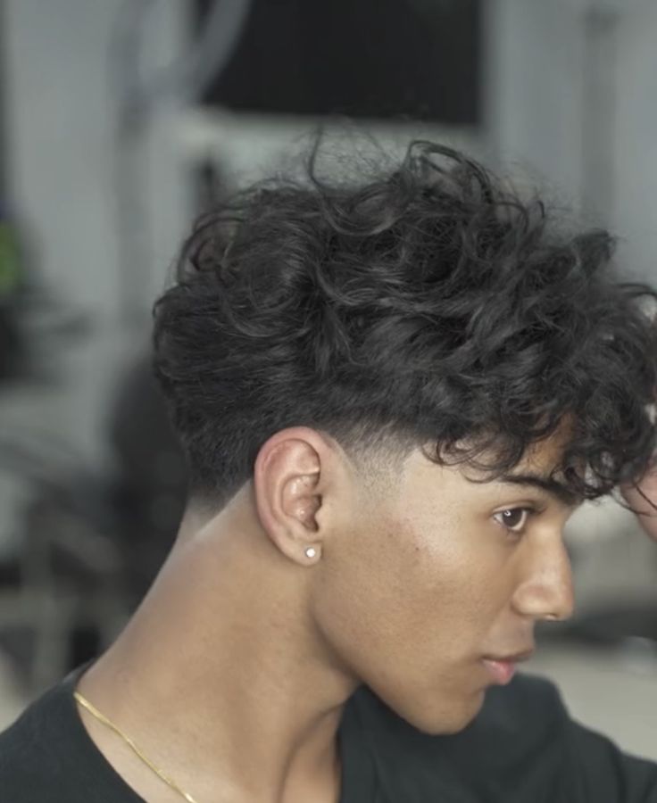 Curly low taper fade 
