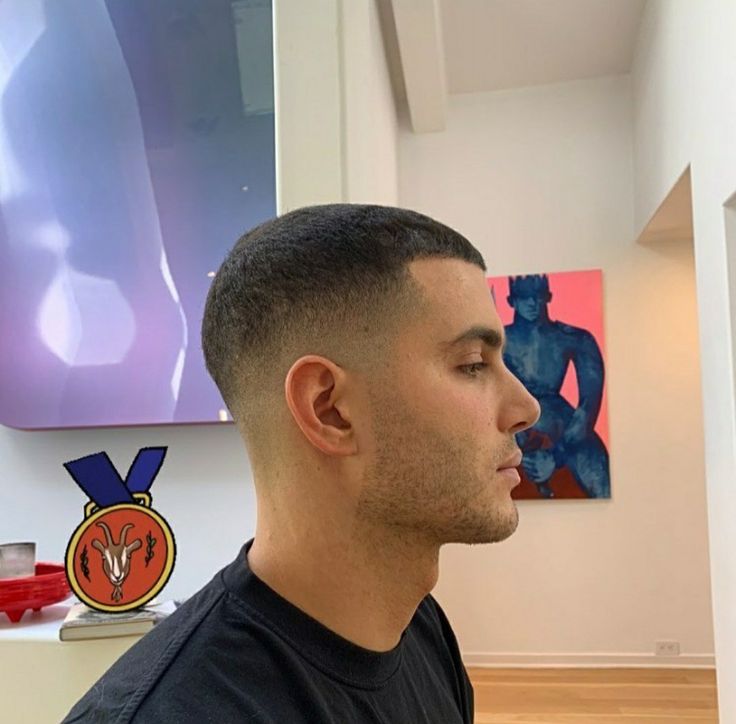 buzz low taper fade 
